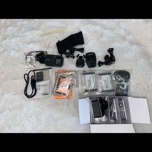 GoPro hero4 - battery pack, Wi-Fi timer click, extra housing.